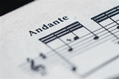 What Does Andante Mean in Music: A Delve into the World of Its Interpretations and More